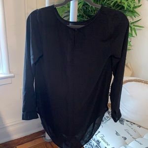 Black blouse and sleeveless knit maxi dress